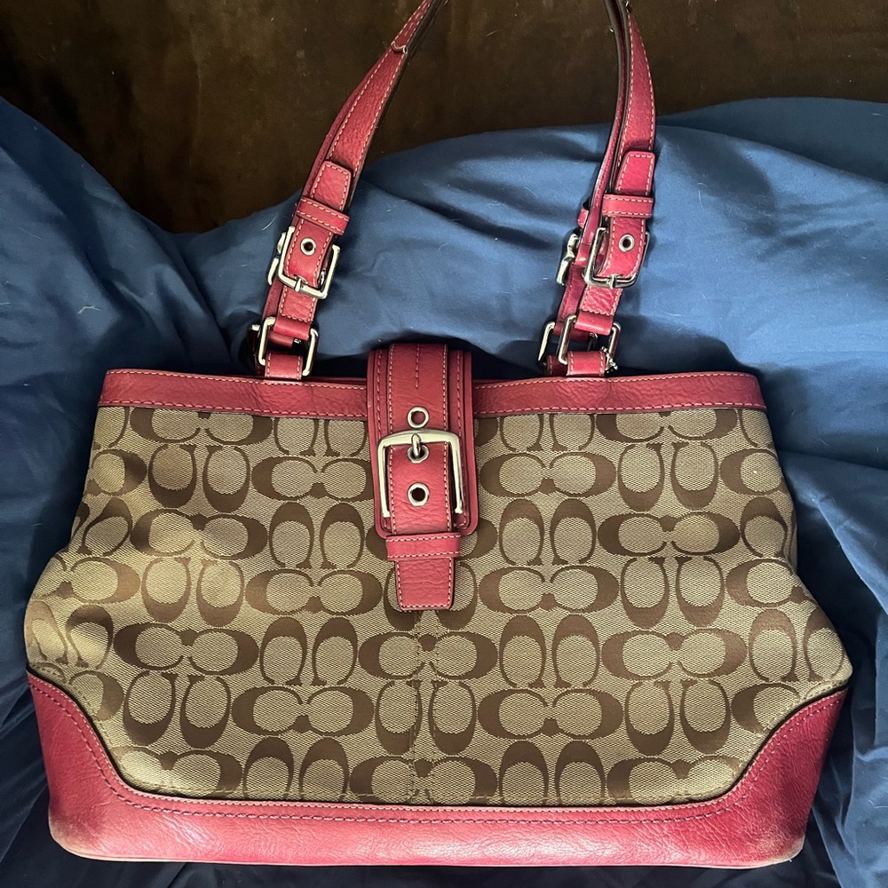 Authentic Coach bag with matching coin purse wristlet.  Pink and Beige.